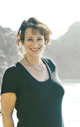 Image of Dr. Renée Lertzman among the mountains